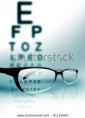 /album/fotogaljerjeja/stock-photo-glasses-on-the-background-of-eye-test-chart-81154963-jpg1/